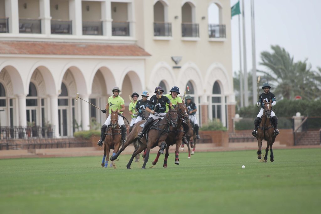 Equestrian polo riders playing at Al Habtoor Polo Club - Dubai