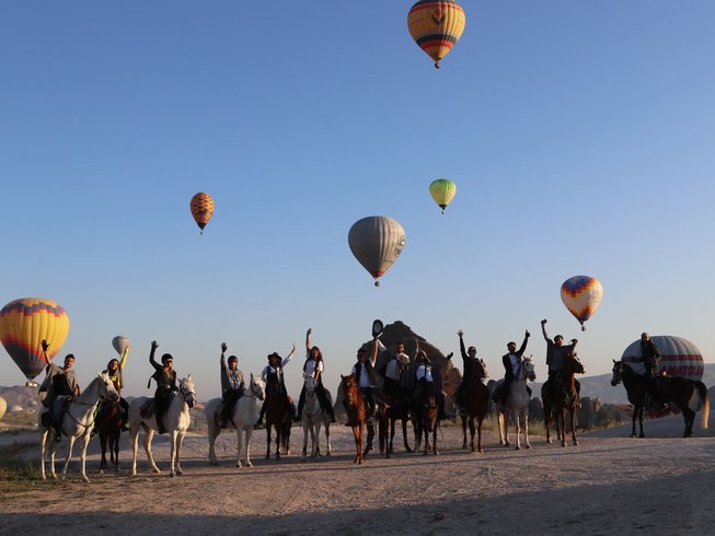 group photo of horse riders in cappadocia