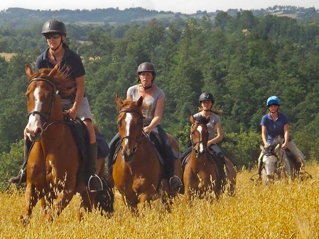 Horse riding holidays Italy - riding in a field