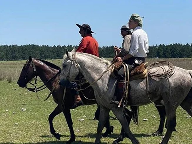 Gauchos riding in argentina