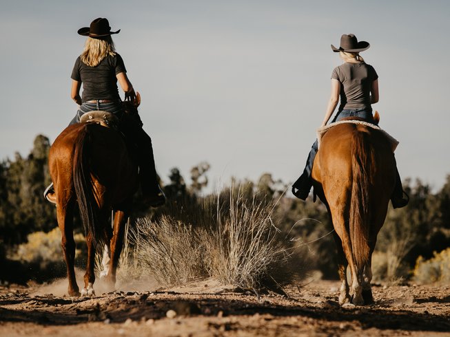 western riders during a ranch vacation in new mexico