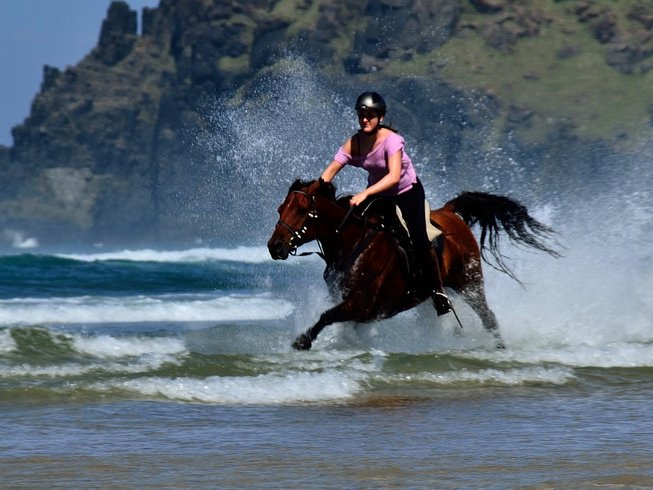 Rider galloping in the sea